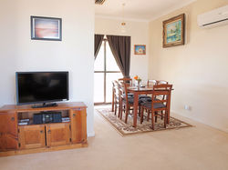 Cottonwood Cottage  dining room & TV