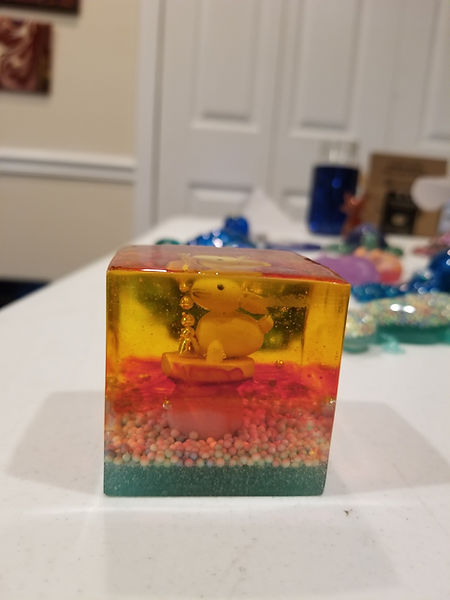 Bunny | 3" resin cube with a bunny with green, pink and yellow layered resin | resin | resin art | resin artist | resin artwork | resincrafter | resincraft