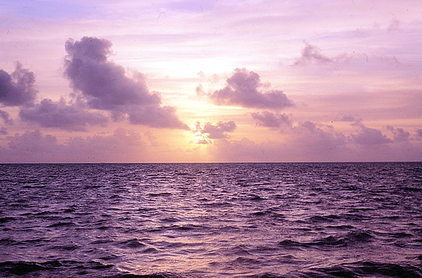 Sunrise, Sunset | phto of a faily calm sea at sunrise or sunset faded light coming from the clouds | nature | nature lovers | nature photography | nature photographer | sunrise | sunset | sunrise vibes | Sunset Vibes