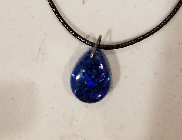 Pretty in Blue | 1" resin blue sparkle pendant on a 18" wax cord| resin jewelry | resin | resin art | resin craft | resin artist | resin crafter