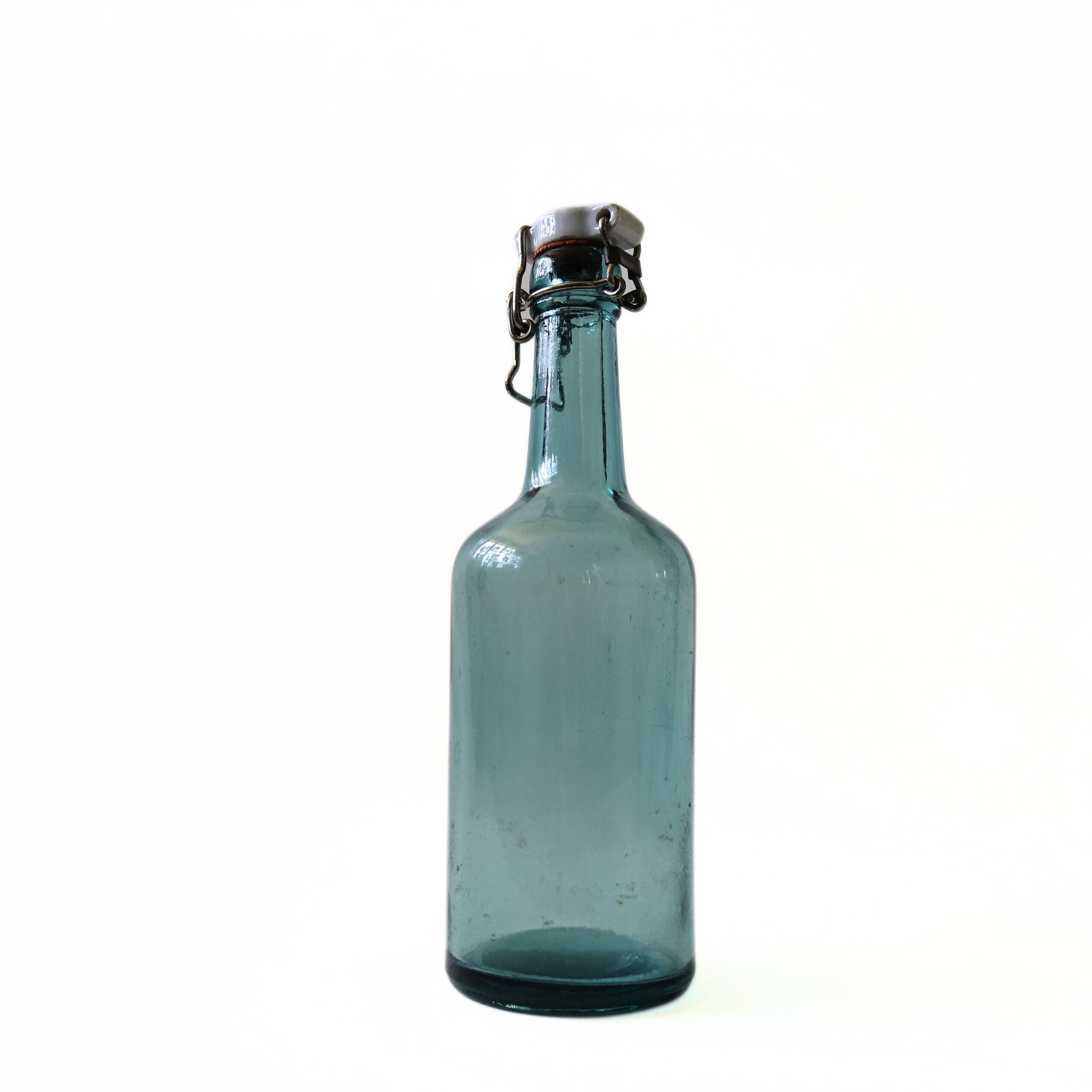 Vintage small green glass bottle with porcelain lid, ÅRNÄS from Sweden early 1