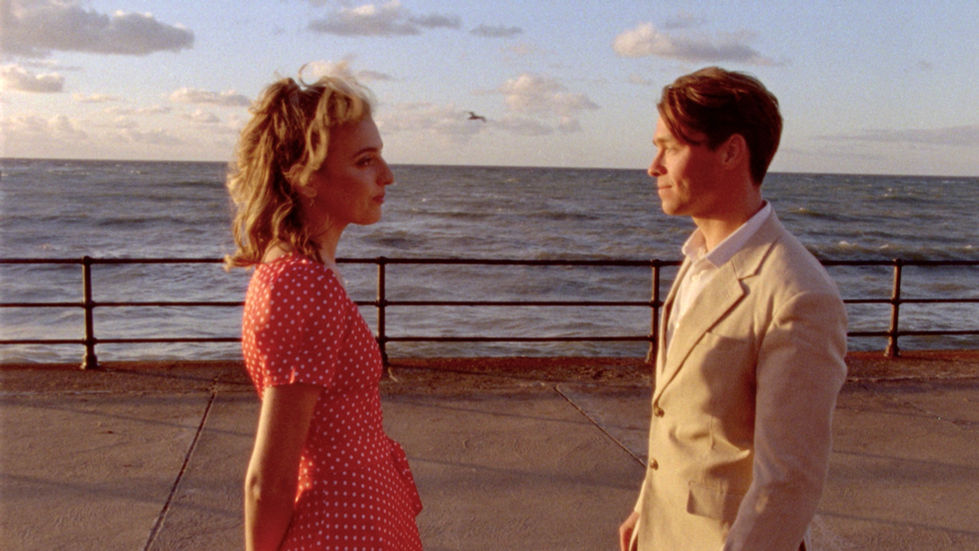 Ellen and Joe gaze at one another lovingly. 