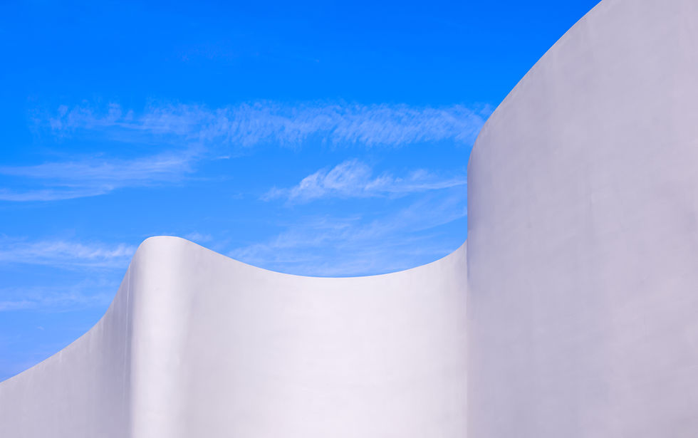 white-curve-concrete-exterior-wall-of-modern-build-2025-03-11-15-52-52-utc.jpg