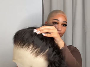 model showing baddiezinc curly human hair wig