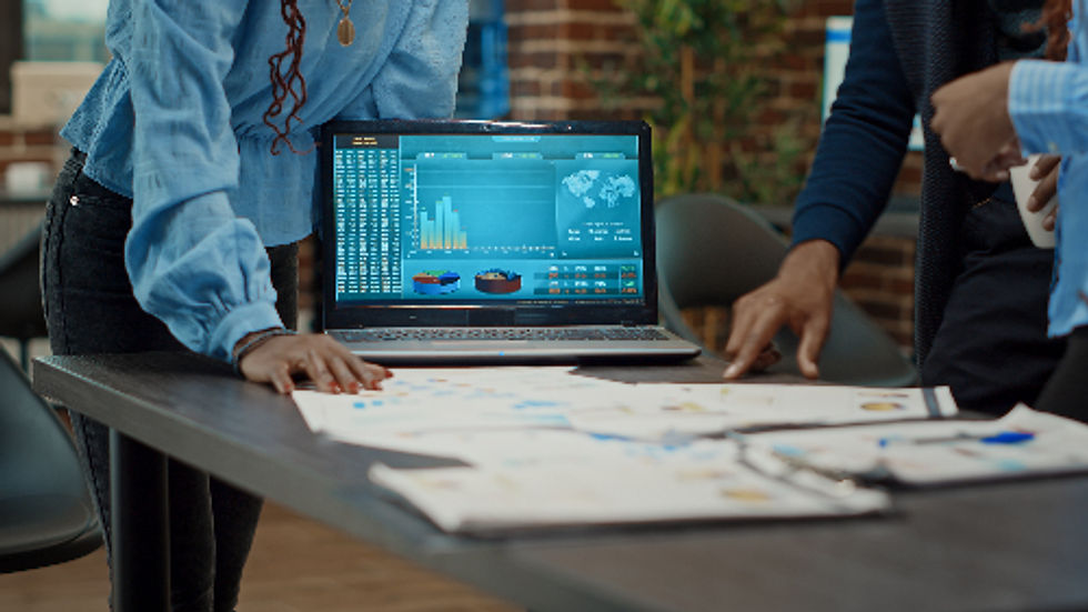 Marketing person reviewing digital strategy on a tablet