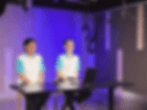 Eye-level view of a seminar audience engaged in discussion