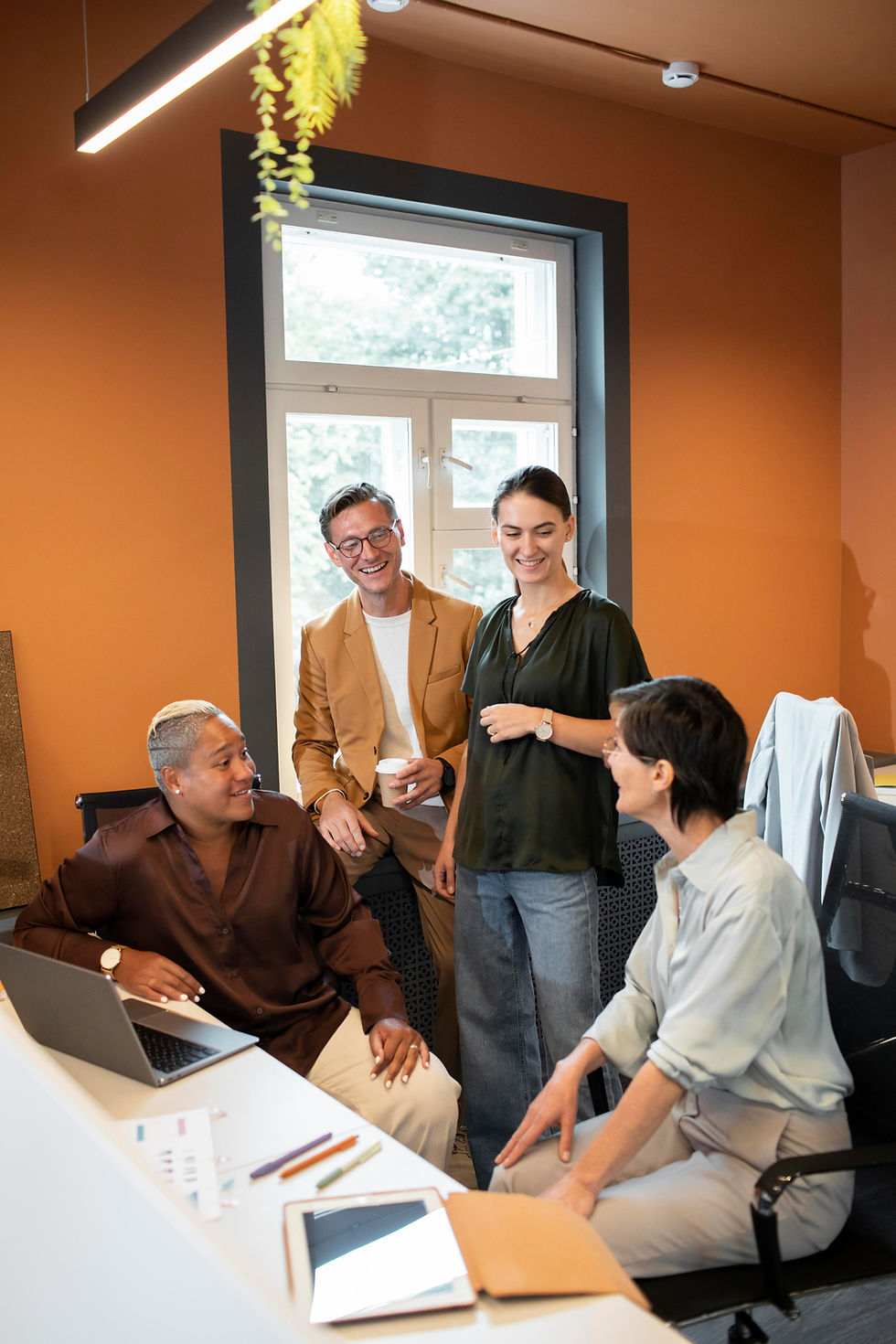 medium-shot-people-chatting-work (1) (1).jpg