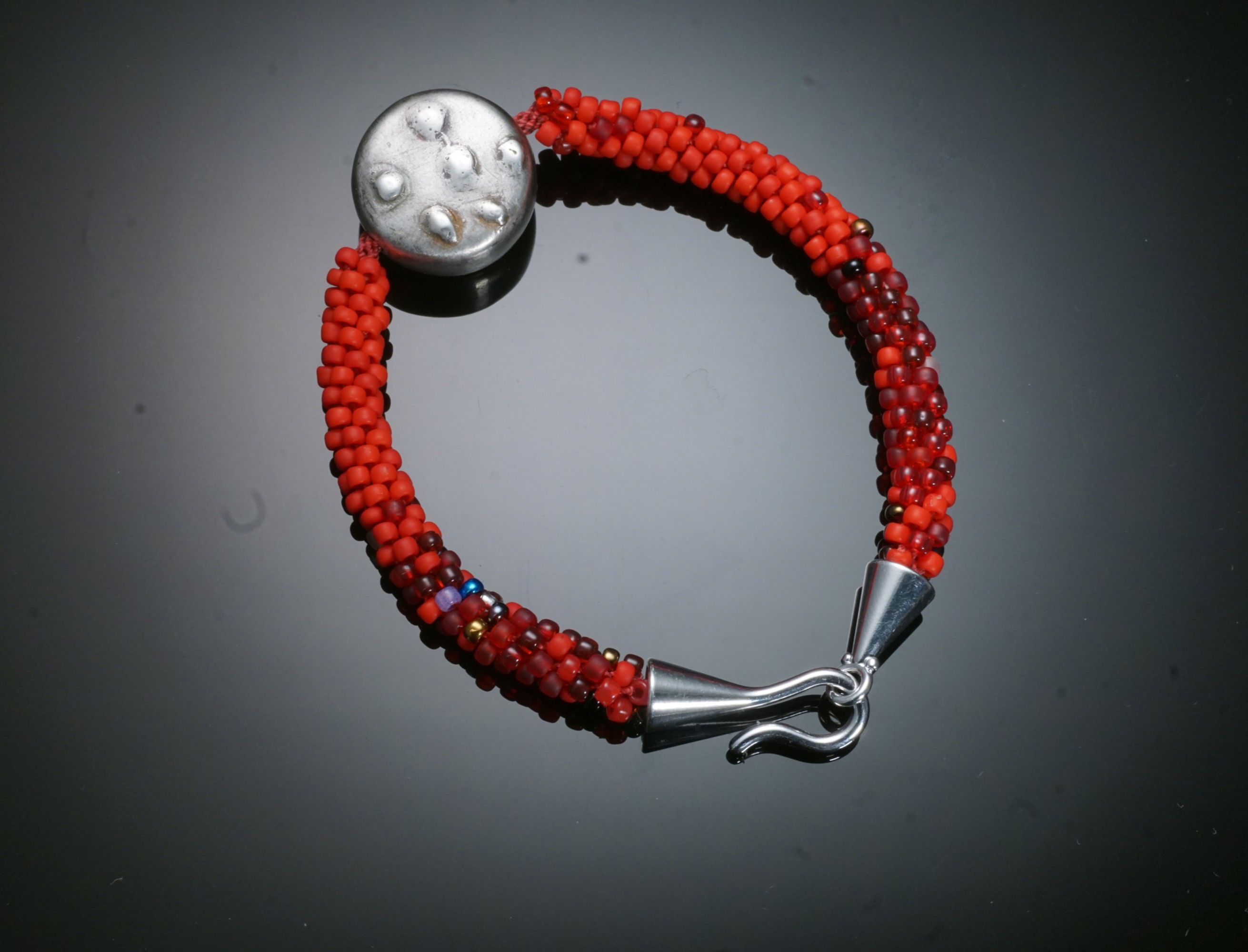 Red beaded Kumihimo and silver bracelet, Red beaded bracelet with large silver