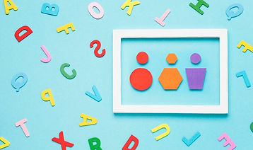 different-colored-geometrical-shapes-white-frame_23-2148642261.jpg