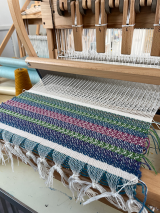 Fabric woven during a Weaving Workshop