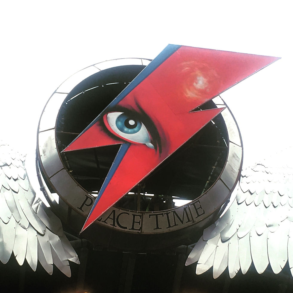 Bowie looks from the top of the Pyramid Stage
