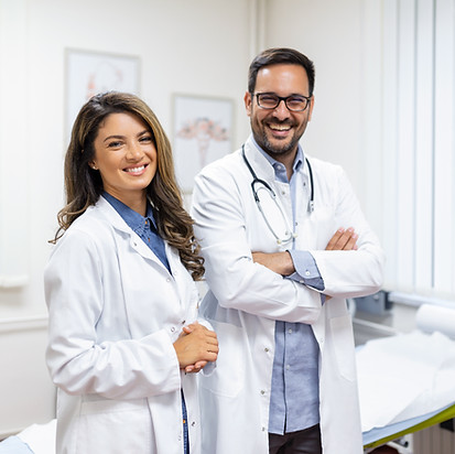 portrait-smiling-young-doctors-standing-together-portrait-medical-staff-inside-modern-hosp