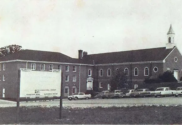 In this 1950 black-and-white image, the Luther Rice College building is shown from Franconia Road, attached to Franconia Baptist Church.