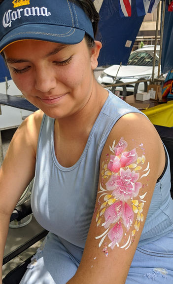 Cincinnati festival flower arm face paint