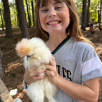 girl with chicken