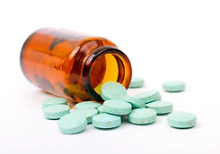 Pills in apothecary bottle