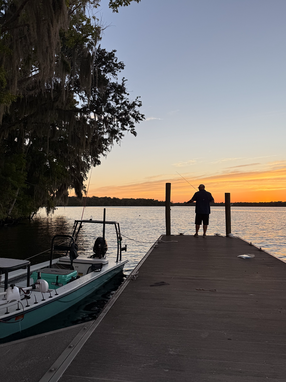 Fishing off the dock at sunset.