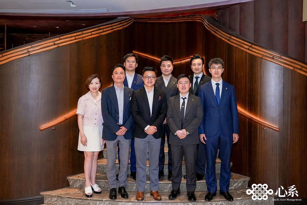 Group photo of XinXi’s core management team, first line from left: Ms. Lily Pang, Mr. Joel Tan, Mr. Marcus Wong, Mr. Robert Wang, Mr. Charles Chen, second line from left: Mr. Byron Chen, Mr. Morris Yeung, Mr. Marty Soo