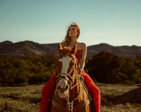 Twinnie Turns Heartbreak into a Hoedown in “Giddy Up” Video