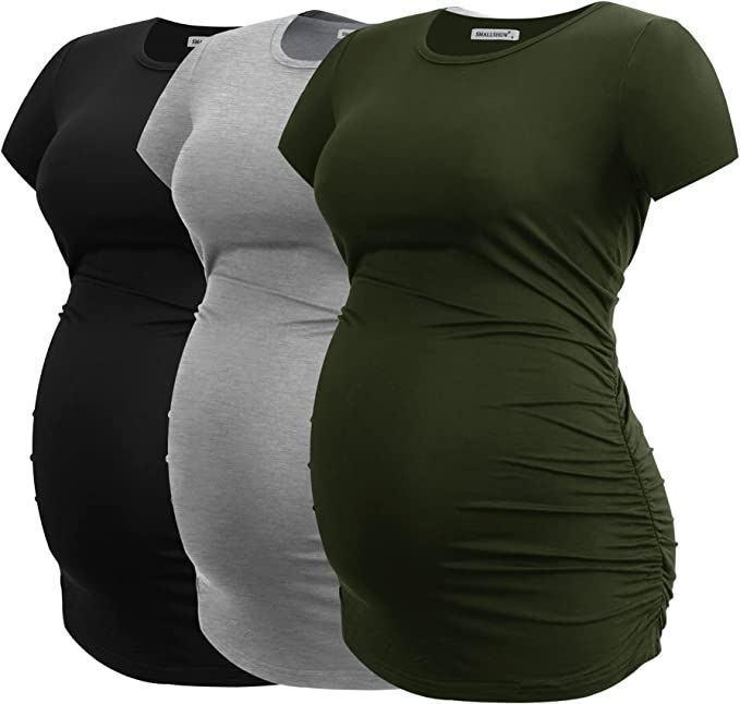 Three pregnancy shirts - one in green, black, and gray.