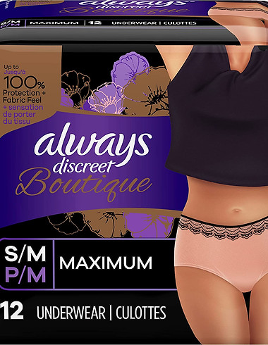 A box of always discreet womens underwear and a model on the front wearing them.