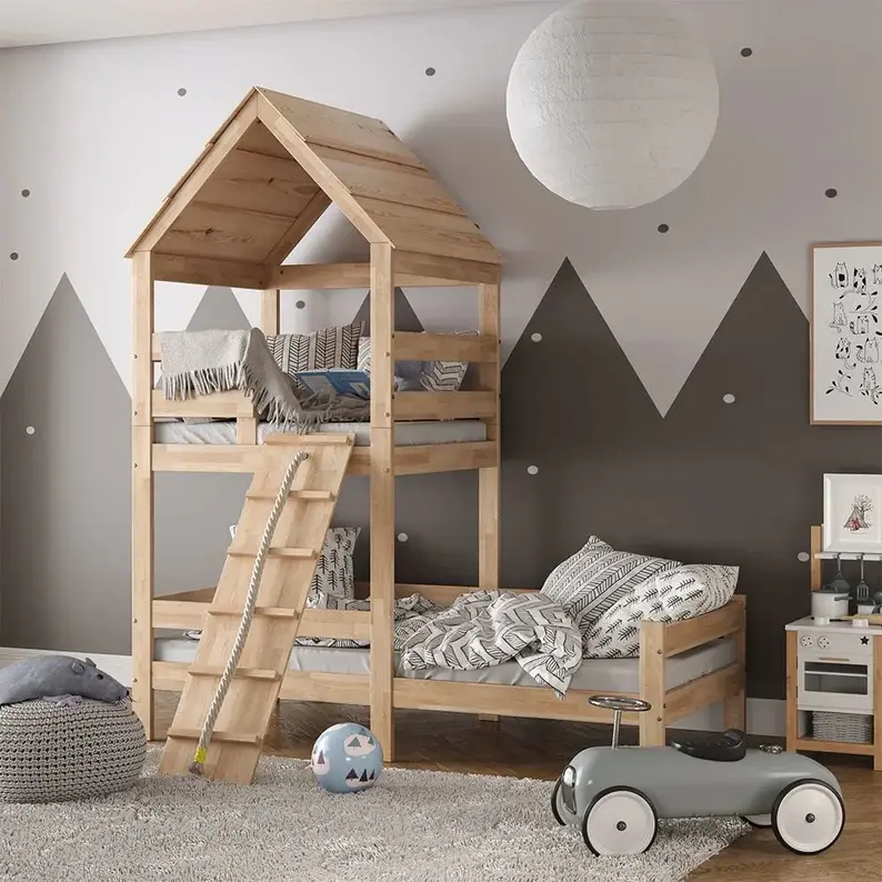 A kids bedroom featuring a toy car, blue ball, and double bunk wooden toddler bed.
