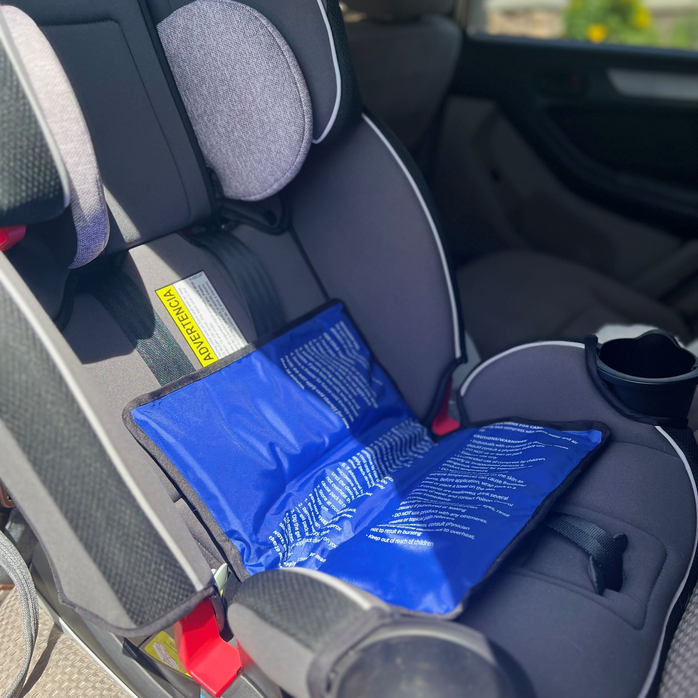 A graco car seat in the sun with an icepack covering the belt buckles.