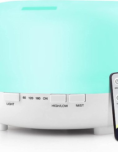 An essentials oil diffuser with a blue light.