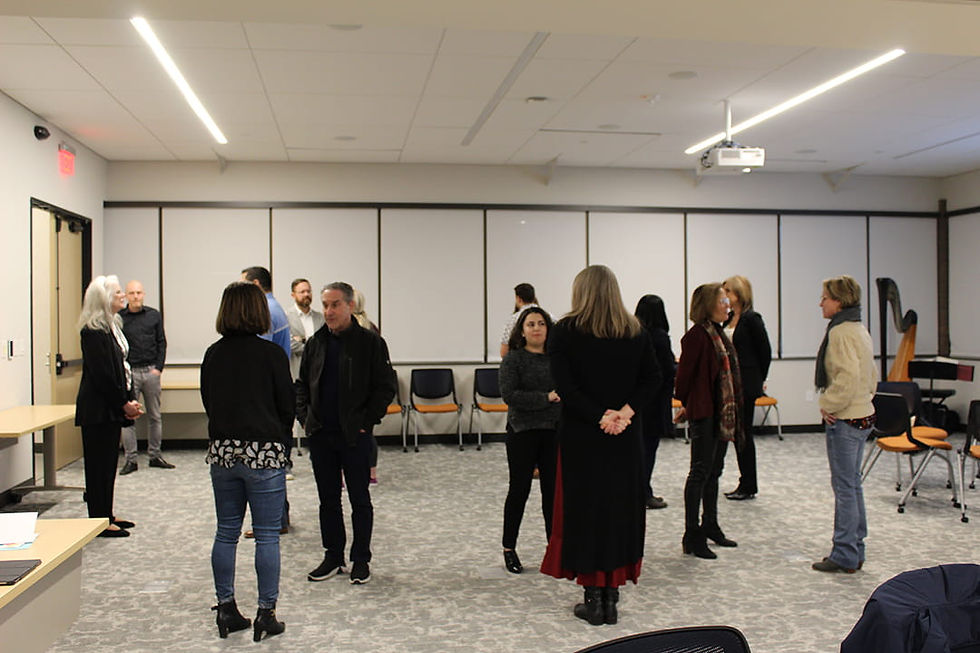 People networking in meeting room