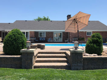 Our back deck area is spacious and capable of entertaining many family members and friends! Comfy deck chairs, sun umbrellas, well-kept landscaping, and gorgeous green grass are among some of the features of this amazing space.