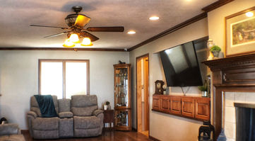 Residents love relaxing in our spacious family room and watching the evening news, sitting by the fire with a good book, or visiting with other residents. We are truly a family!