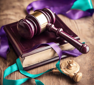 A gavel with a purple and teal awareness ribbon..jpg