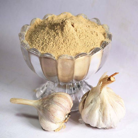 Jar containing onion powder and dehydrated garlic powder mix.