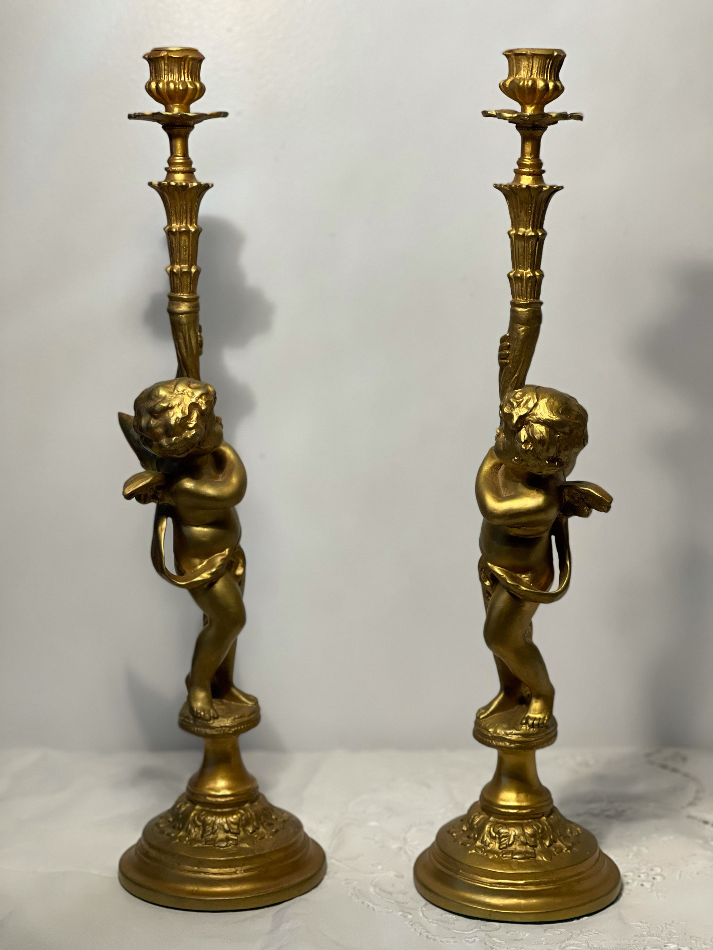 Cupid candlesticks