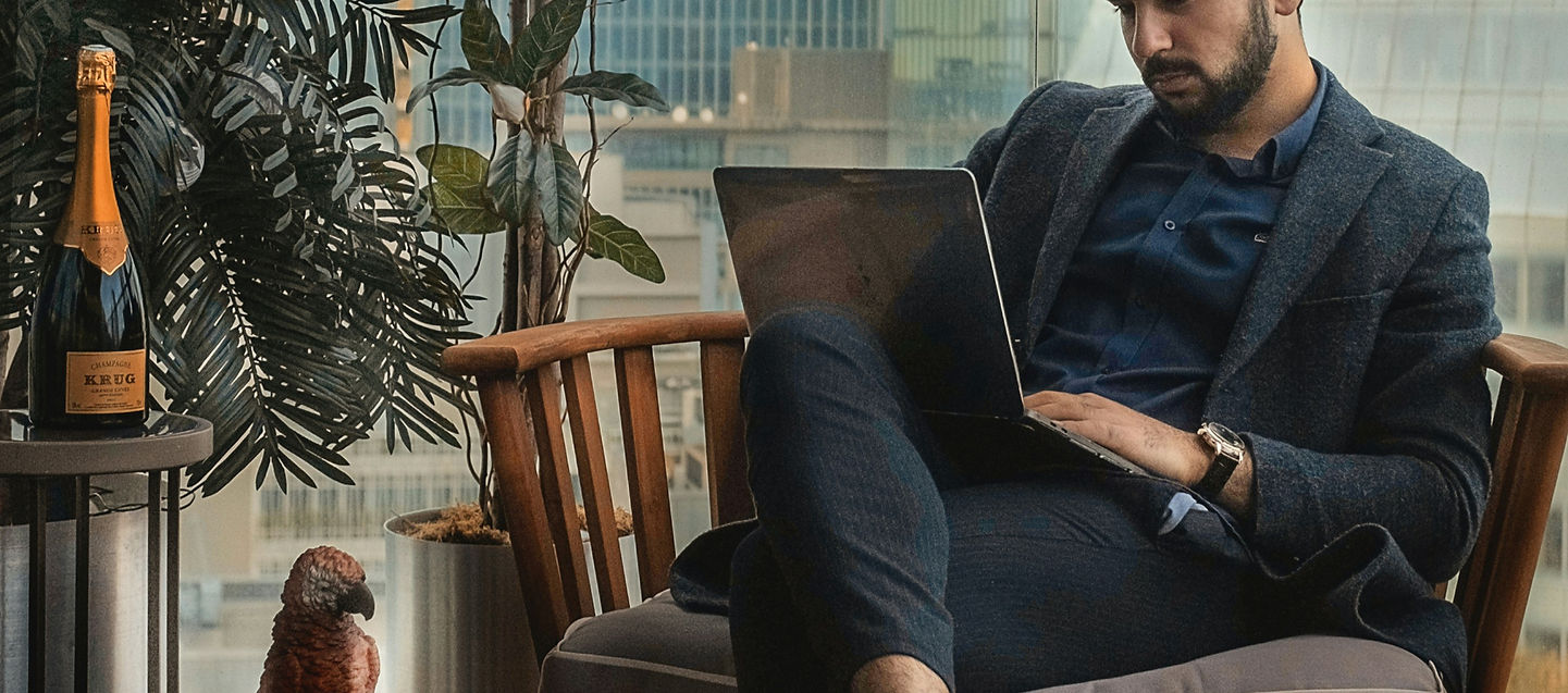 Focused entrepreneur working on laptop – illustrating high-income skill development and remote work.