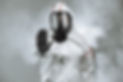 keep the distance, stop to coronavirus. disinfector male in gas-mask and protective suit d