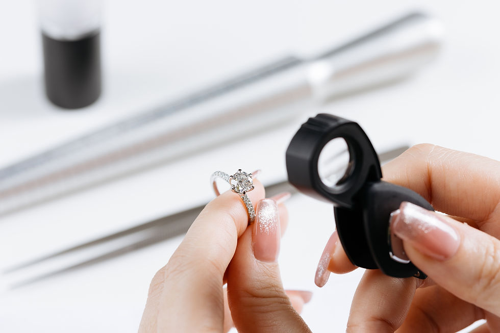 Eye-level view of a jeweler sketching a custom diamond ring design