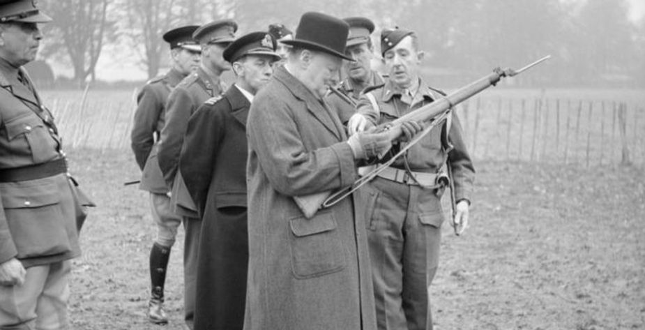 Prime Minister Winston Churchill inspects a no.4 Lee Enfield rilfe