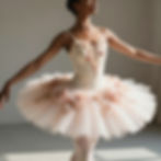 Ballerina posing in floral Couture Costumes ballet tutu