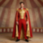 Man wearing red and gold Couture Costumes with a long cape.