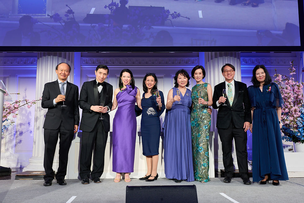 All the Honorees and Emcees on stage for a toast