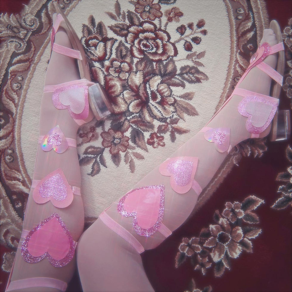 pink heart gladiator sandals based on the circle sandals by pattie boyd that i re-designed and released. these have graduating sized hearts in different types of faux leather like pearl pink, holographic, and fine and chunky glitter