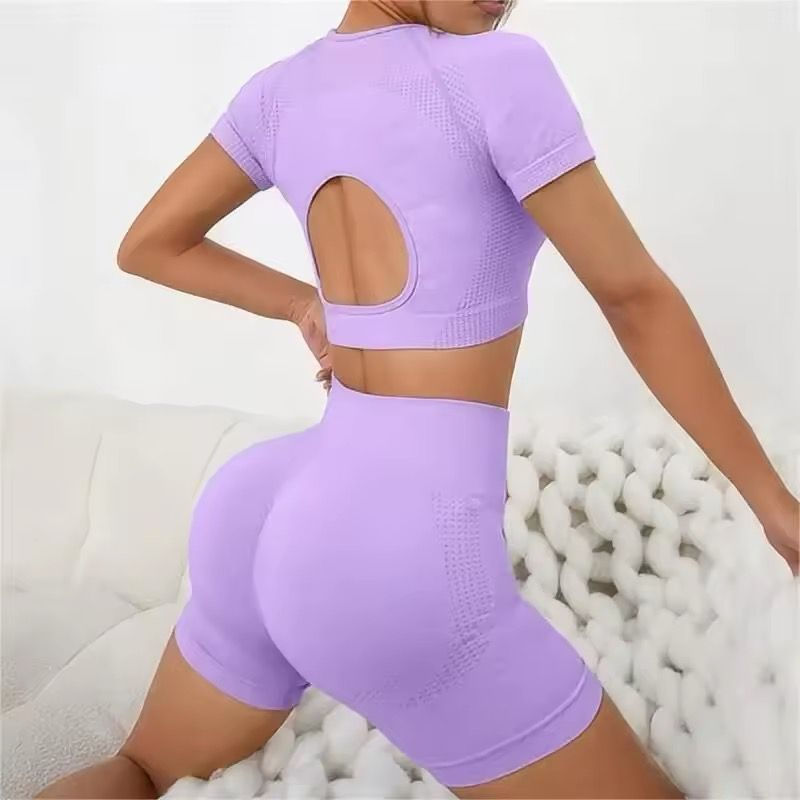 Women's Yoga Wear features a 2-Piece Hollow-Out Short Sleeve Top and High Waist