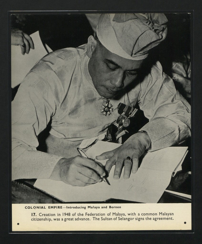 The Sultan of Selangor signing the Federation of Malaya Agreement in 1948