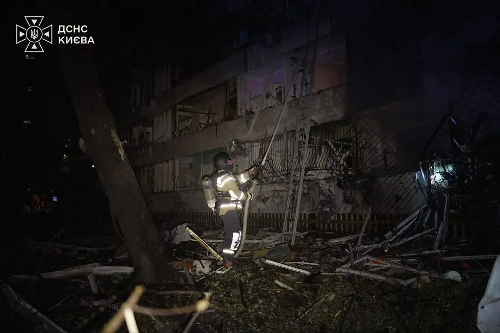 Rubble and destruction at a nine-story residential building hit by a Russian missile in Kyiv's Desnianskyi district on October 14, 2026