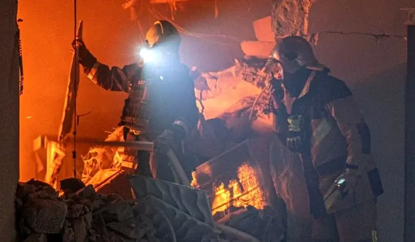 Rescue workers at the site of a Russian strike on civilian buildings, September 17, 2026