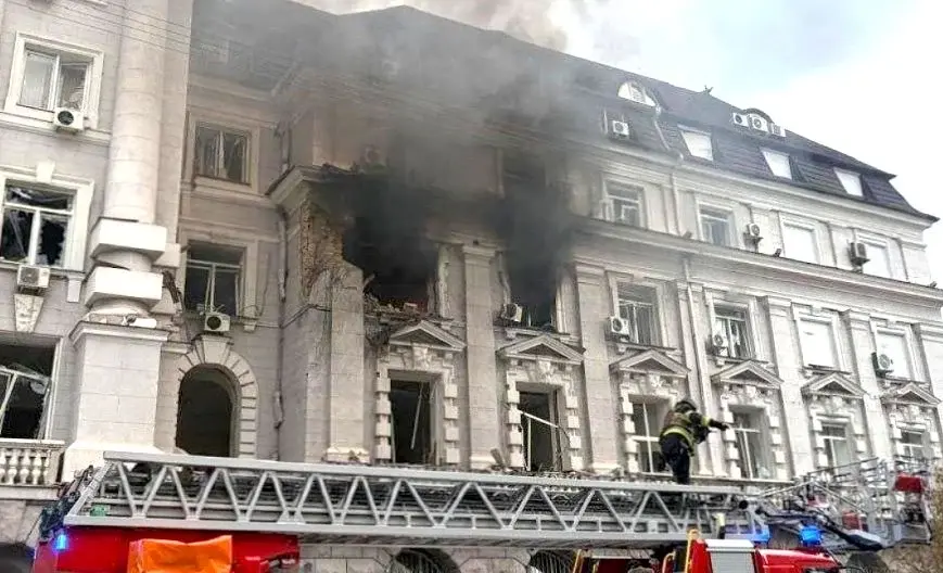 Firefighters work at the site of the Russian drone strike on the SBU headquarters area in central Kyiv, September 4, 2026
