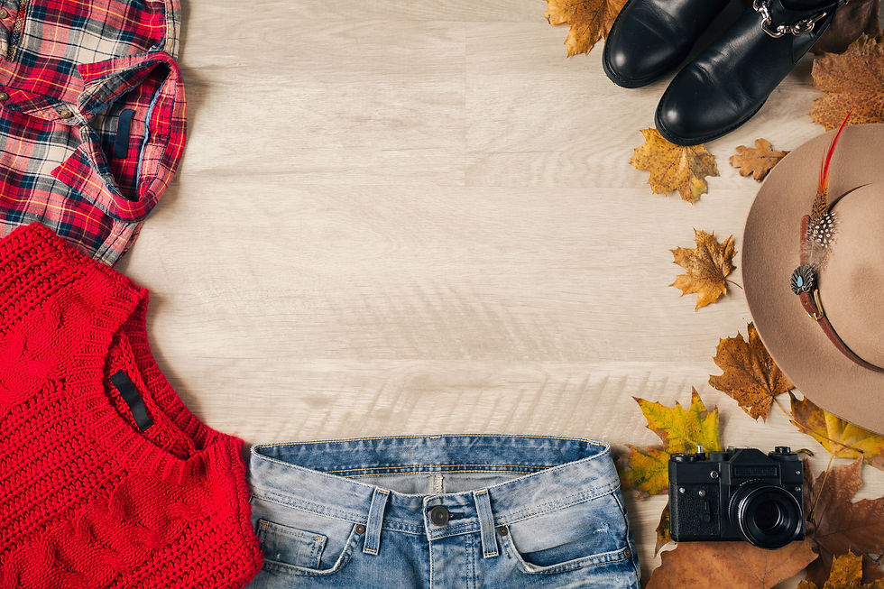 flat-lay-woman-style-accessories-red-knitted-sweater-checkered-shirt-denim-jeans-black-lea