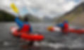 Two people Kayaking on Wastwater with mountains in the background.jpg