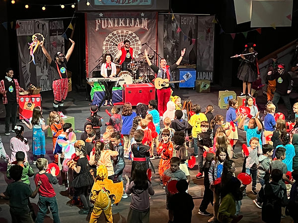 FunikiJam performers lead children in an interactive world music concert.